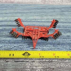 Vtg Ertl 1/64 scale International Harvester winged harrow diecast/plastic red